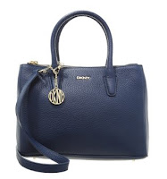 http://www.awin1.com/cread.php?platform=dl&awinmid=3356&awinaffid=32306&clickref=&p=https%3A%2F%2Fwww.zalando.co.uk%2Fdkny-tribeca-handbag-ink-dk151h03z-k11.html