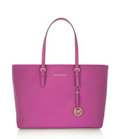 http://click.linksynergy.com/fs-bin/click?id=CX54I0Ftnrk&subid=0&offerid=254410.1&type=10&tmpid=6887&RD_PARM1=http%3A%2F%2Fwww.net-a-porter.com%2Fgb%2Fen%2Fproduct%2F487577%2Fmichael_michael_kors%2Fjet-set-travel-textured-leather-tote
