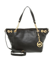 http://www.awin1.com/cread.php?platform=dl&awinmid=3356&awinaffid=32306&clickref=&p=https%3A%2F%2Fwww.zalando.co.uk%2Fmichael-michael-kors-jet-set-tote-bag-black-mk151h04u-q11.html