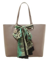 http://www.awin1.com/cread.php?platform=dl&awinmid=3356&awinaffid=32306&clickref=&p=https%3A%2F%2Fwww.zalando.co.uk%2Fdkny-tote-bag-desert-lizard-dk151h03y-b11.html